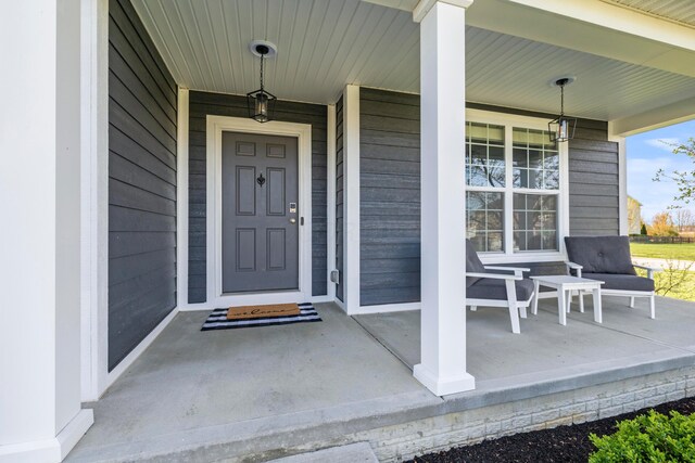 entrance to property with covered porch