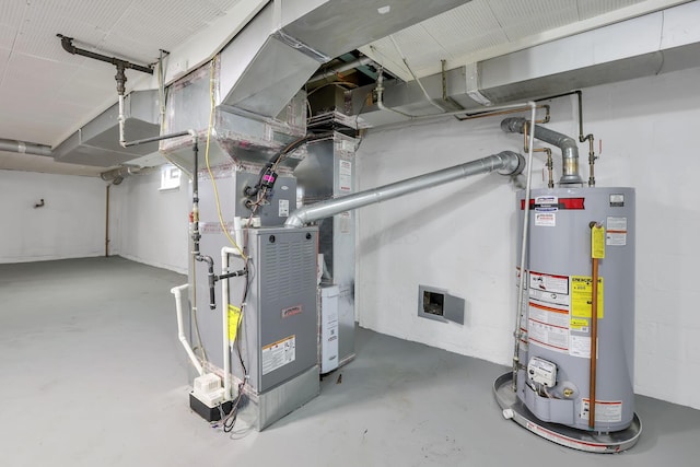 utility room with water heater