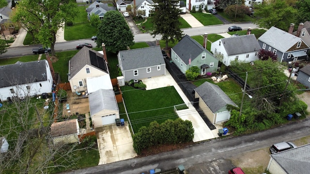birds eye view of property with a residential view