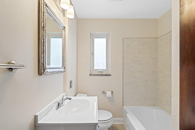 full bathroom featuring toilet, a wealth of natural light, baseboards, and  shower combination