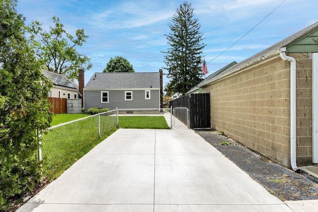 exterior space featuring a gate and fence