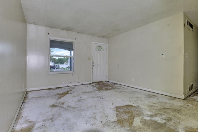 5143 Rutledge Dr N, Columbus, OH 43232 - interior space featuring baseboards, concrete flooring, and visible vents