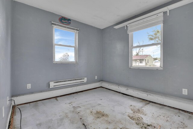 5143 Rutledge Dr N, Columbus, OH 43232 - unfurnished room with a baseboard heating unit and a healthy amount of sunlight