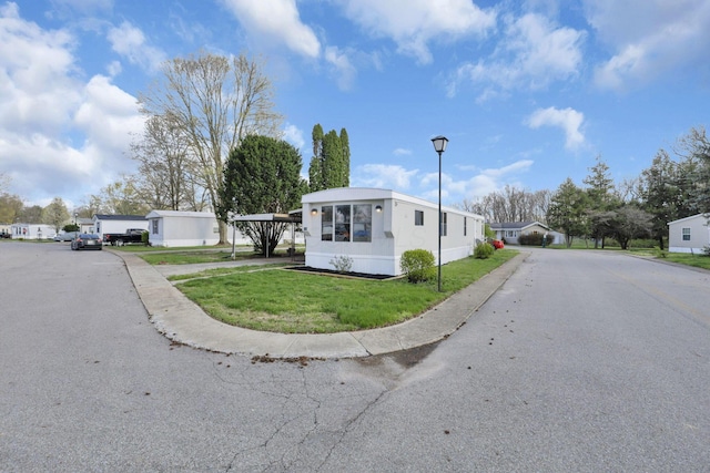 2445 Columbus Lancaster Rd NW, Lancaster, OH 43130 - exterior space featuring driveway and a front lawn