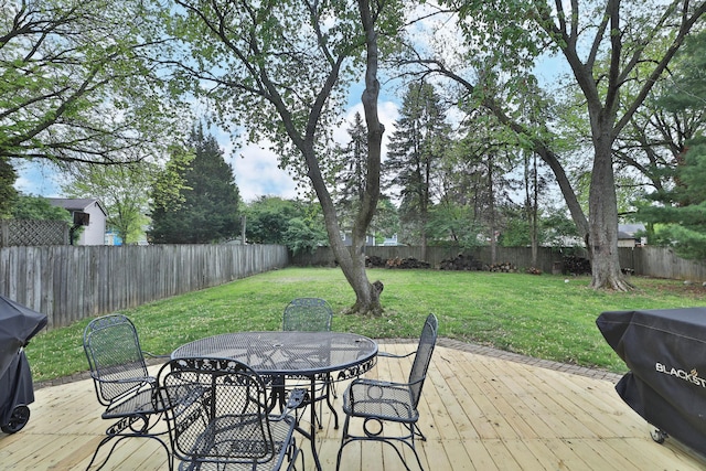 wooden terrace featuring outdoor dining space