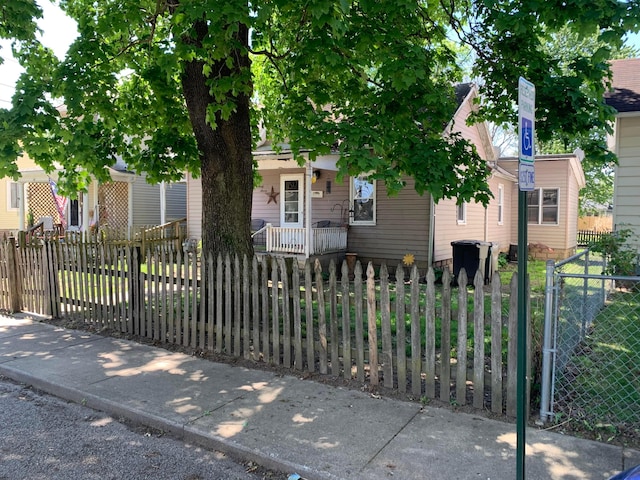 167 Fountain St, Logan, OH 43138 - view of property hidden behind natural elements with a fenced front yard