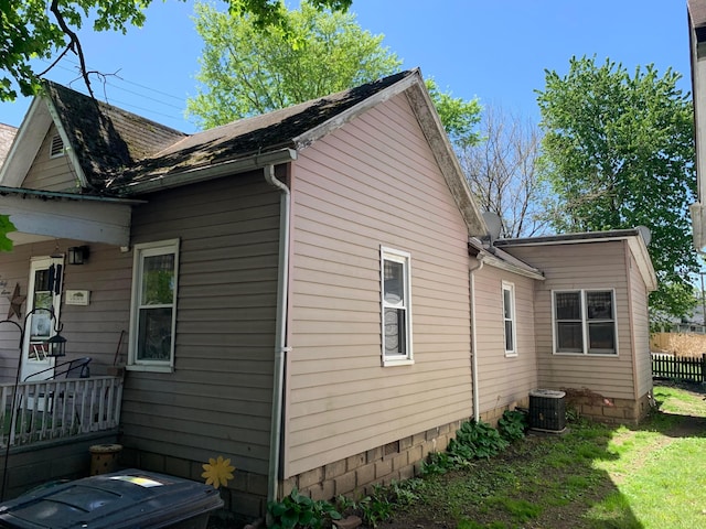 167 Fountain St, Logan, OH 43138 - view of side of property featuring central AC unit and fence