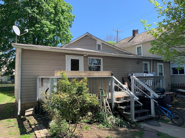 167 Fountain St, Logan, OH 43138 - rear view of property featuring fence and a deck