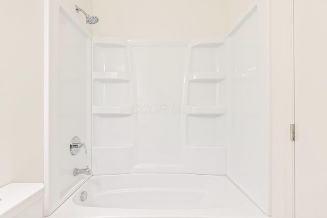 bathroom featuring toilet
