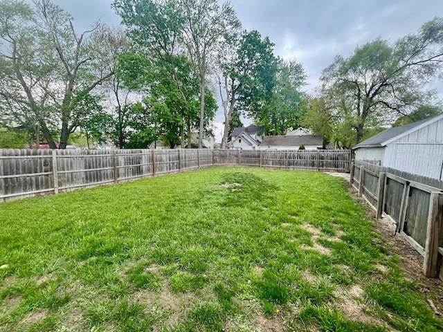 view of yard featuring a fenced backyard