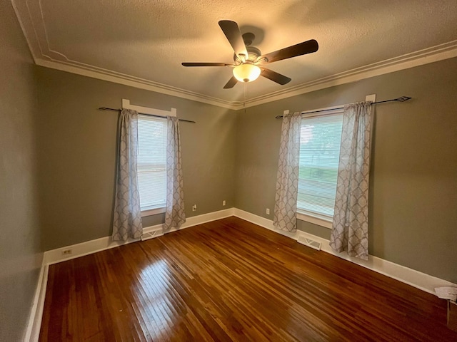 spare room with ceiling fan, a textured ceiling, visible vents, wood-type flooring, and ornamental molding