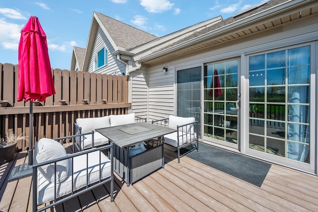 deck featuring outdoor lounge area