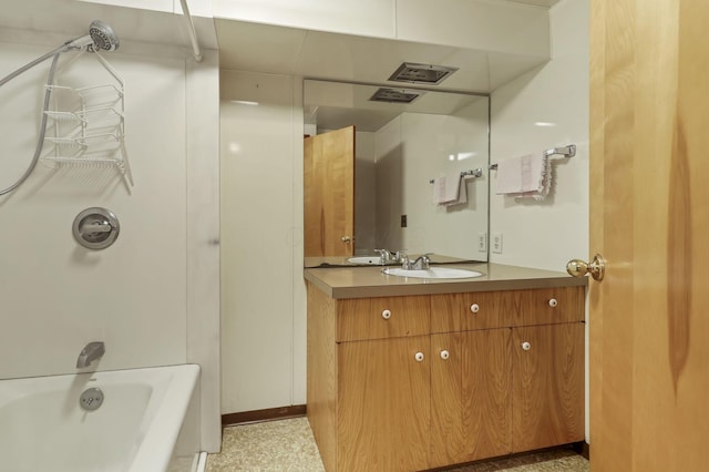 bathroom with shower / washtub combination and vanity