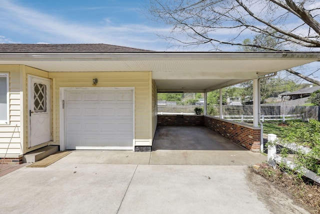 exterior space with fence and driveway