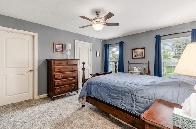 bedroom featuring a ceiling fan and carpet flooring