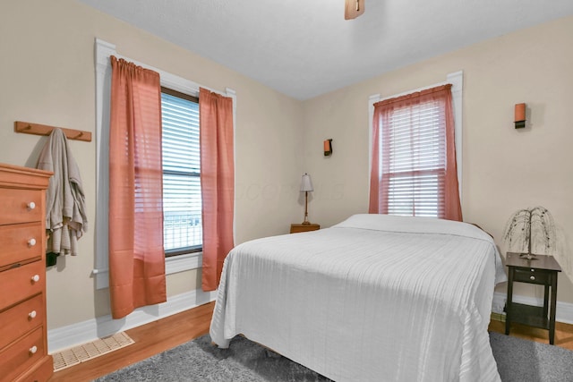 54 E Smiley Ave, Shelby, OH 44875 - bedroom featuring baseboards, visible vents, and multiple windows