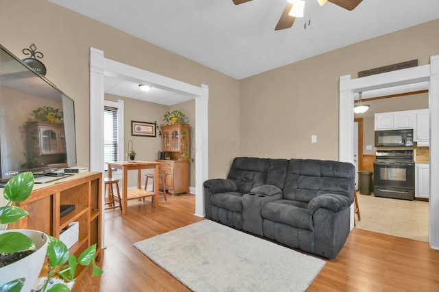 54 E Smiley Ave, Shelby, OH 44875 - living area with ceiling fan and light wood-type flooring