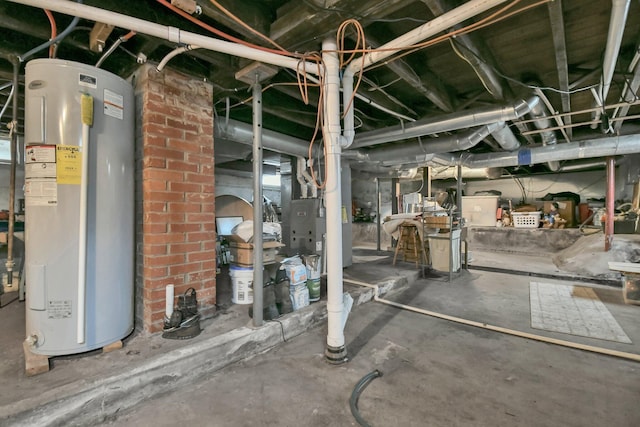 54 E Smiley Ave, Shelby, OH 44875 - unfinished below grade area featuring heating unit and water heater