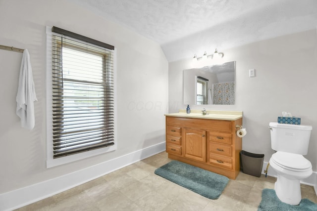 54 E Smiley Ave, Shelby, OH 44875 - full bathroom featuring vanity, toilet, a textured ceiling, baseboards, and vaulted ceiling