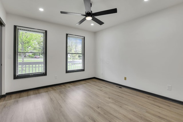 845 Mcnaughten Rd, Columbus, OH 43213 - spare room with recessed lighting, baseboards, a ceiling fan, and light wood-style floors