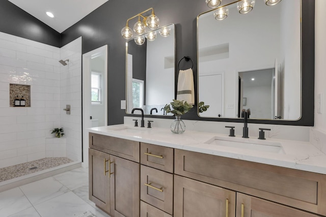 845 Mcnaughten Rd, Columbus, OH 43213 - bathroom featuring a sink, a walk in shower, double vanity, and marble finish floor
