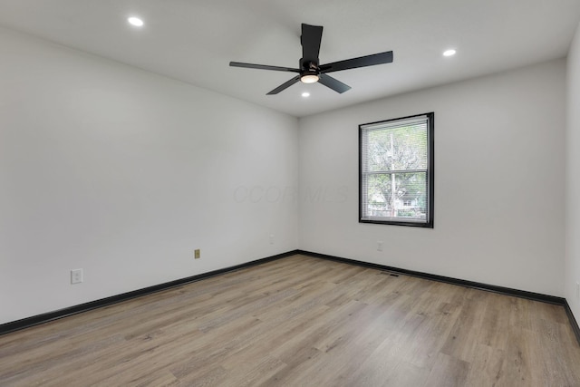 845 Mcnaughten Rd, Columbus, OH 43213 - unfurnished room featuring recessed lighting, baseboards, and light wood-style flooring