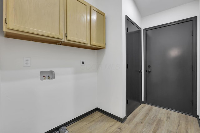 845 Mcnaughten Rd, Columbus, OH 43213 - washroom featuring cabinet space, hookup for a washing machine, light wood-style floors, electric dryer hookup, and baseboards