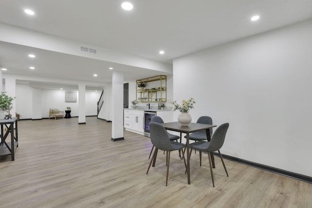 845 Mcnaughten Rd, Columbus, OH 43213 - dining room with visible vents, recessed lighting, baseboards, and light wood-type flooring