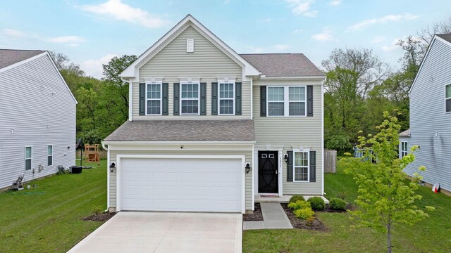 5837 Mouzon Dr, Columbus, OH 43232 - traditional home featuring a garage, concrete driveway, a shingled roof, and a front yard