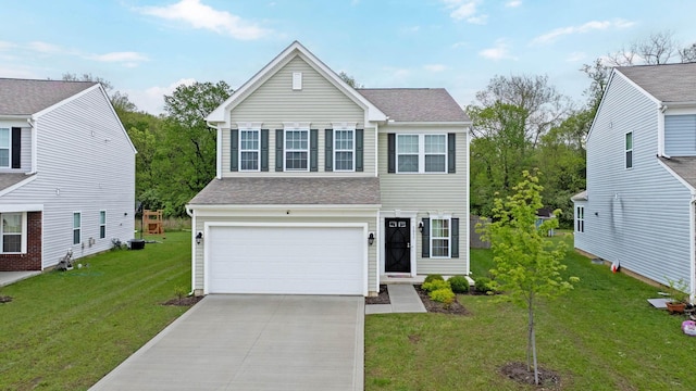 5837 Mouzon Dr, Columbus, OH 43232 - traditional home featuring concrete driveway, a front yard, roof with shingles, and an attached garage