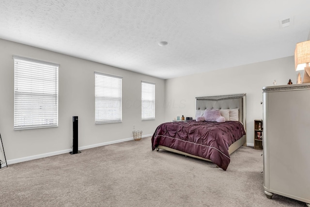 5837 Mouzon Dr, Columbus, OH 43232 - bedroom with carpet flooring, a textured ceiling, and baseboards