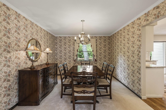 4522 Crompton Dr, Columbus, OH 43220 - dining space featuring a chandelier, plenty of natural light, baseboards, and crown molding