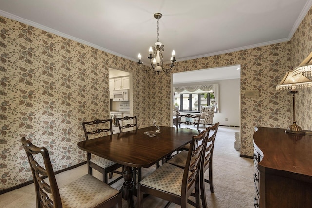4522 Crompton Dr, Columbus, OH 43220 - dining space featuring a chandelier, crown molding, light colored carpet, wallpapered walls, and baseboards