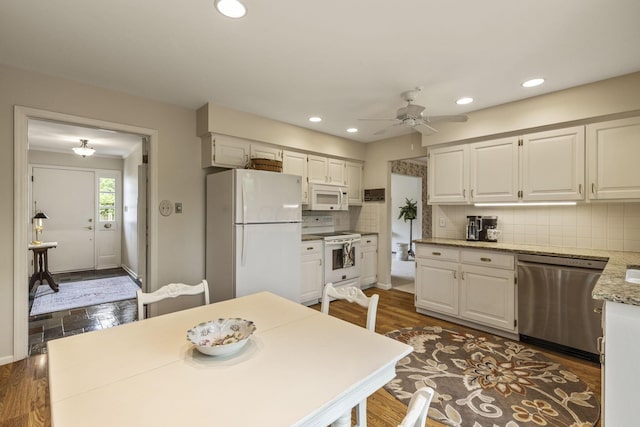 4522 Crompton Dr, Columbus, OH 43220 - kitchen with white appliances, backsplash, white cabinets, ceiling fan, and recessed lighting
