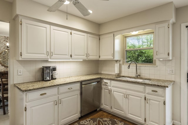 4522 Crompton Dr, Columbus, OH 43220 - kitchen with dishwasher, a sink, white cabinetry, and ceiling fan