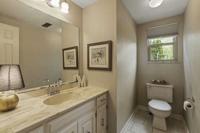 4522 Crompton Dr, Columbus, OH 43220 - half bath featuring toilet, tile patterned floors, vanity, and baseboards