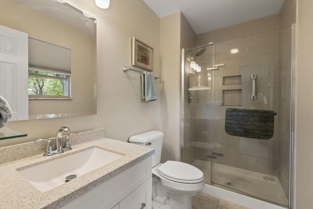 4522 Crompton Dr, Columbus, OH 43220 - full bathroom featuring toilet, a stall shower, vanity, and tile patterned flooring