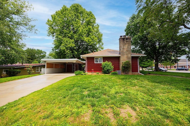 125 S Hamilton Rd, Columbus, OH 43230 - ranch-style house featuring driveway, a front yard, a chimney, a carport, and central AC unit