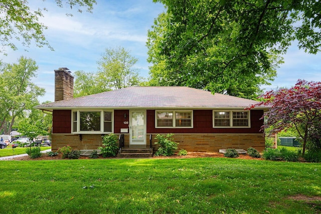 125 S Hamilton Rd, Columbus, OH 43230 - single story home featuring brick siding, a front yard, and a chimney