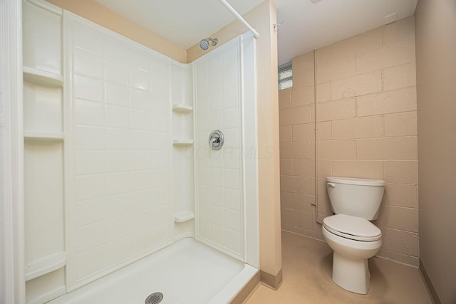 125 S Hamilton Rd, Columbus, OH 43230 - full bath with a shower stall, toilet, and concrete block wall