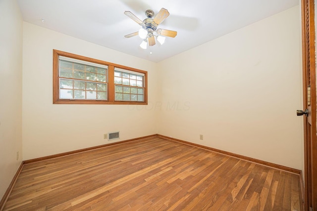125 S Hamilton Rd, Columbus, OH 43230 - spare room with wood finished floors, baseboards, and ceiling fan