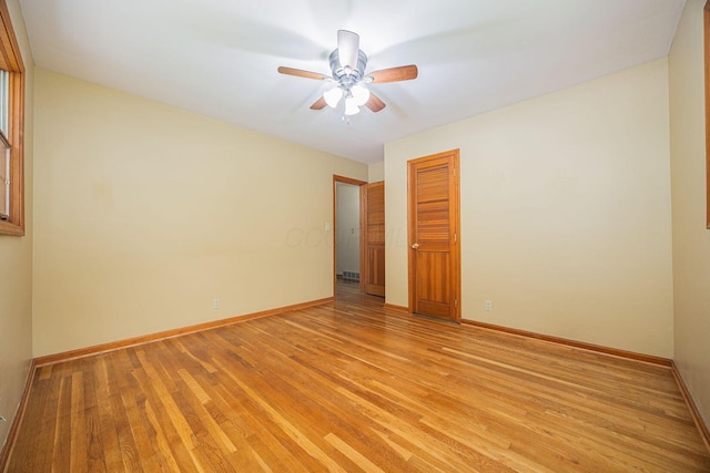 125 S Hamilton Rd, Columbus, OH 43230 - unfurnished room with light wood-type flooring, baseboards, and a ceiling fan