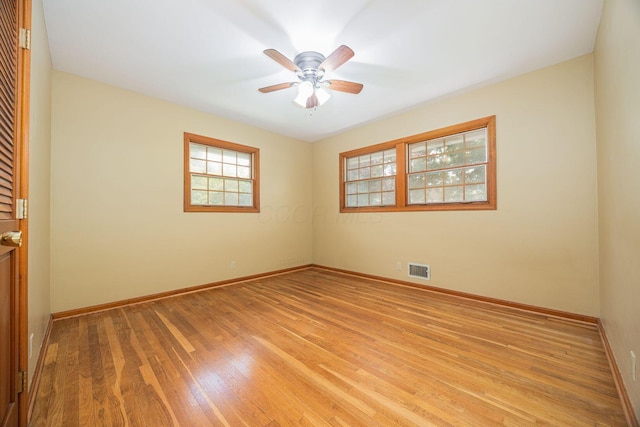 125 S Hamilton Rd, Columbus, OH 43230 - empty room with wood finished floors, baseboards, and ceiling fan
