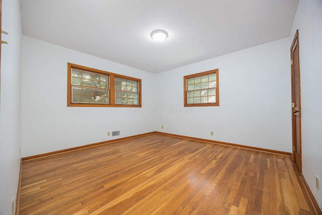 125 S Hamilton Rd, Columbus, OH 43230 - empty room with wood finished floors and baseboards