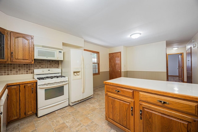 125 S Hamilton Rd, Columbus, OH 43230 - kitchen featuring white appliances, brown cabinets, and light countertops