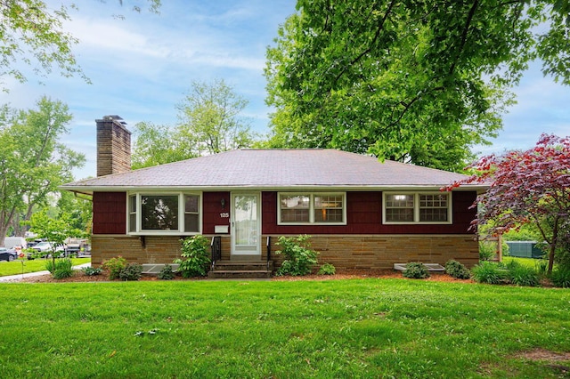 125 S Hamilton Rd, Columbus, OH 43230 - single story home featuring a front yard, brick siding, a chimney, and entry steps