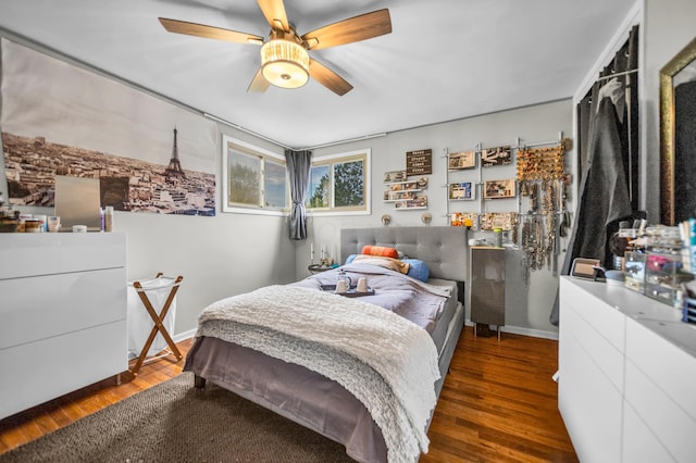 bedroom with ceiling fan and wood finished floors
