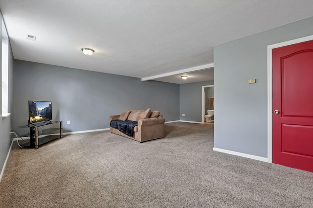 living area featuring carpet floors, baseboards, and visible vents