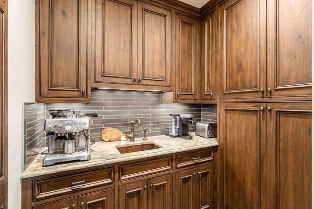 1 Miranova Pl Unit 2230, Columbus, OH 43215 - interior space featuring a sink, decorative backsplash, and a toaster