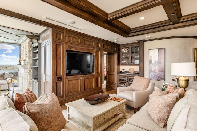 living area with bar, ornamental molding, coffered ceiling, and beam ceiling